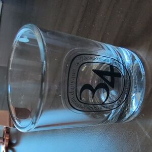 Diptyque empty 34 Boulevard St. Germain 35g candle vessel.